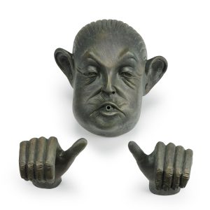 Man In Barrel Spitter